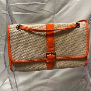 Straw clutch with orange patent accent